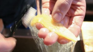 Step 4: Rinse under water.  Peels should be lightly scrubbed with a toothbrush.