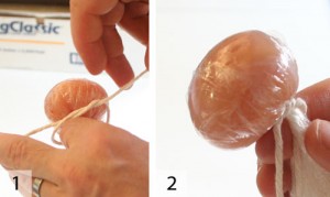 1. Tie the cannonball off. If you use string as pictured, be careful to not rip the plastic.  Tying with plastic minimizes this risk. 2. The finished cannonball.