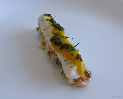 Please Curb Your Dog:  Seafood sausage, egg mustard cream on top of shrimp salad.  (In Sweden, we actually put shrimp salad on our hot dogs. Delicious.)