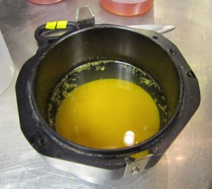 Load the broken gel in centrifuge buckets and spin at 4000 g's for 15 minutes. Whammo! Clarified juice.
